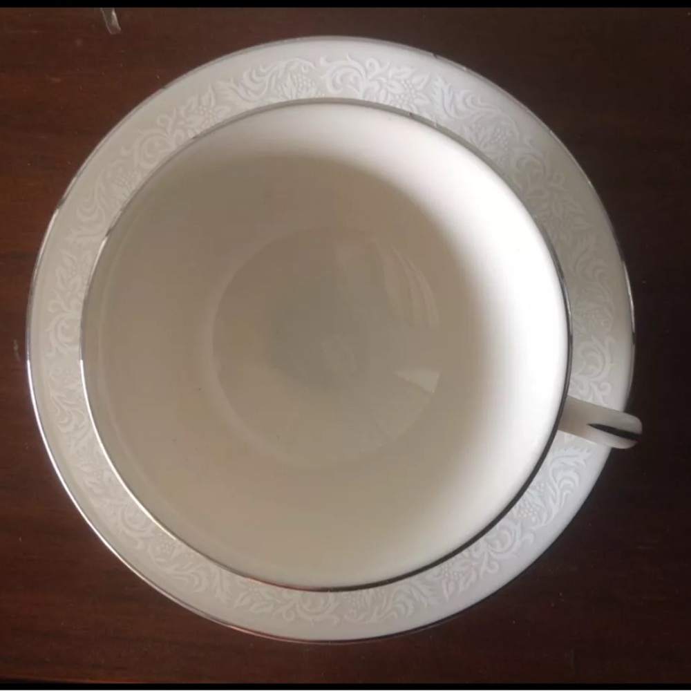 Elegant White China Teacup and Saucer Set